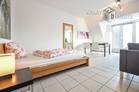 Modern spacious apartment with a little balcony in the heart of the Belgisches Viertel