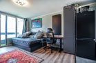 Furnished apartment with balcony in the AXA skyscraper in Cologne-Riehl