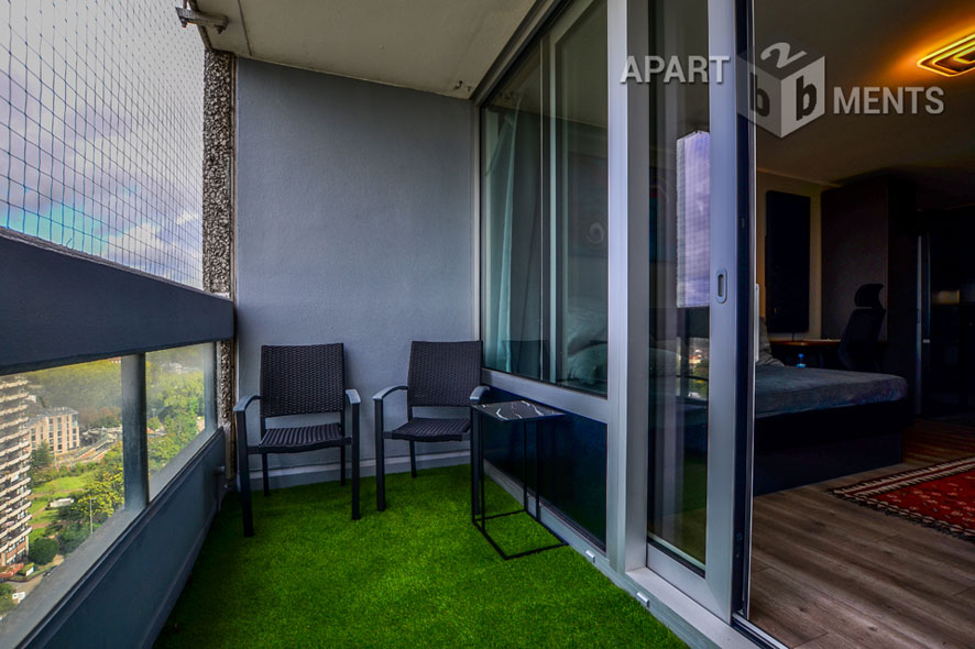 Furnished apartment with balcony in the AXA skyscraper in Cologne-Riehl