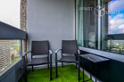Furnished apartment with balcony in the AXA skyscraper in Cologne-Riehl