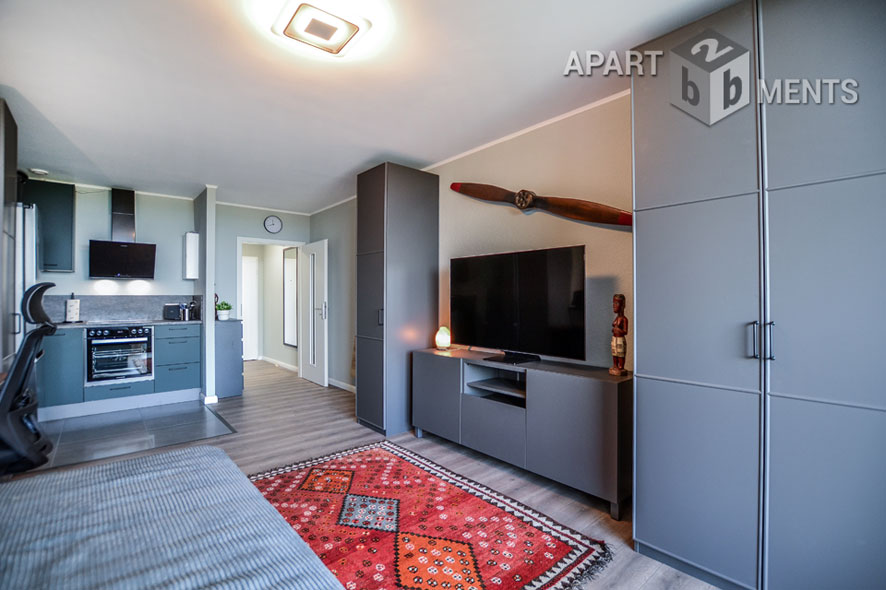 Furnished apartment with balcony in the AXA skyscraper in Cologne-Riehl