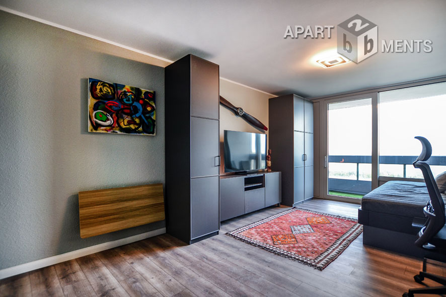 Furnished apartment with balcony in the AXA skyscraper in Cologne-Riehl