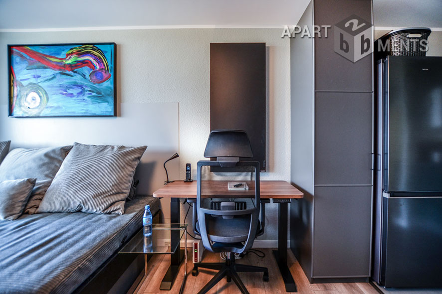 Furnished apartment with balcony in the AXA skyscraper in Cologne-Riehl