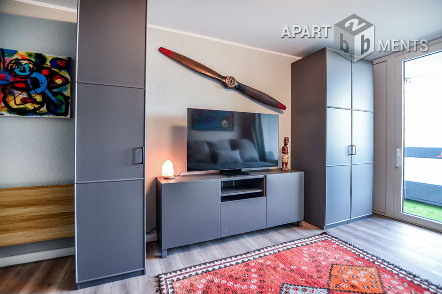 Furnished apartment with balcony in the AXA skyscraper in Cologne-Riehl