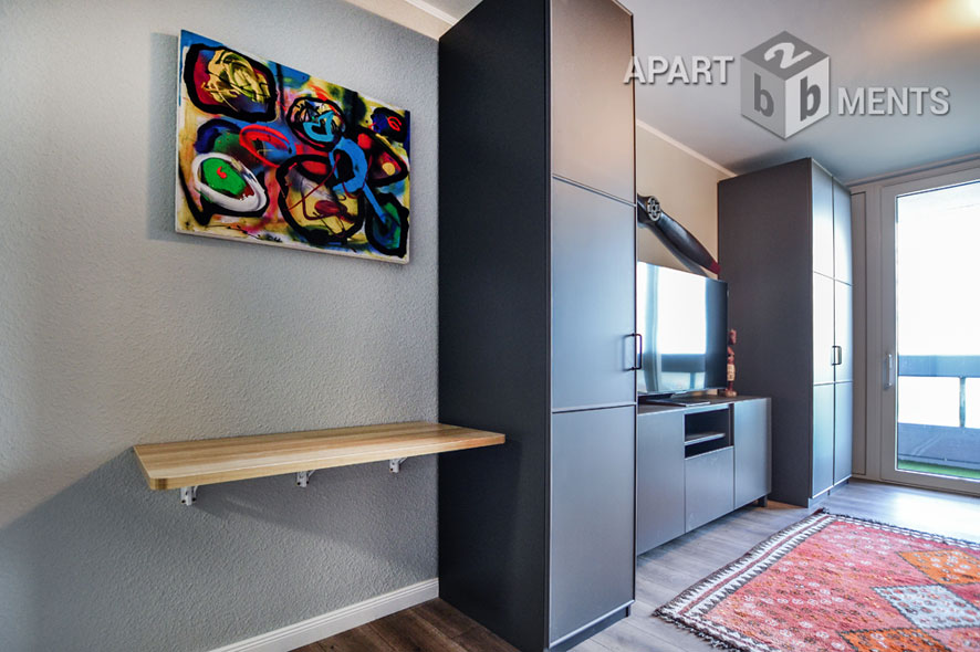 Furnished apartment with balcony in the AXA skyscraper in Cologne-Riehl