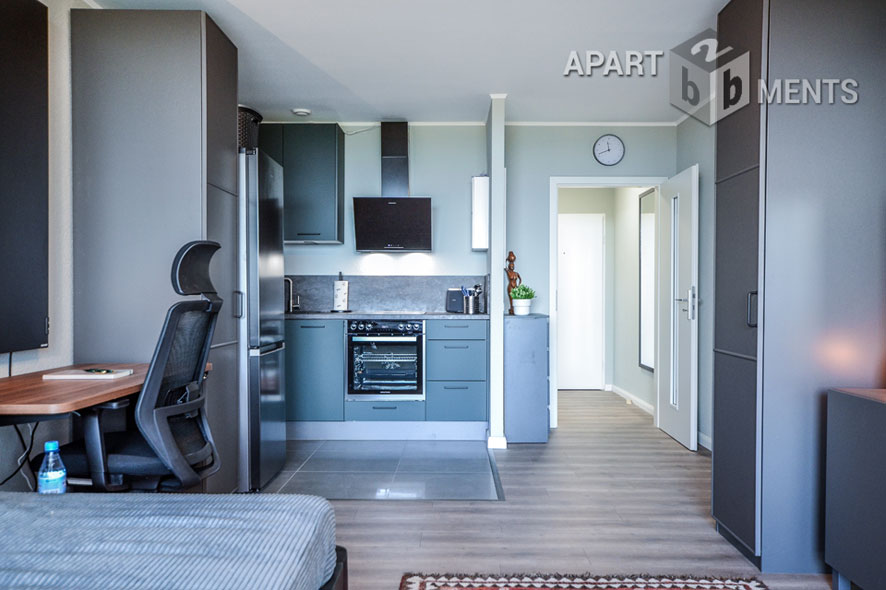 Furnished apartment with balcony in the AXA skyscraper in Cologne-Riehl