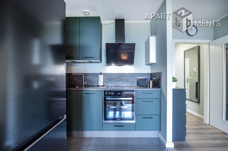 Furnished apartment with balcony in the AXA skyscraper in Cologne-Riehl