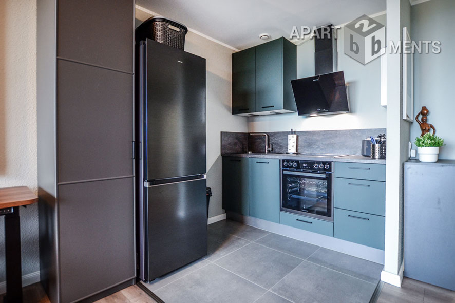 Furnished apartment with balcony in the AXA skyscraper in Cologne-Riehl