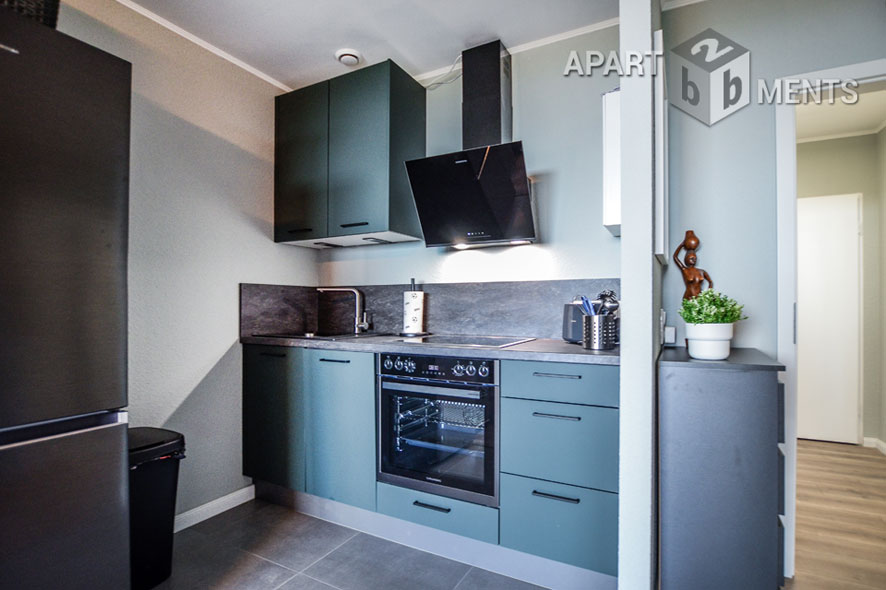 Furnished apartment with balcony in the AXA skyscraper in Cologne-Riehl