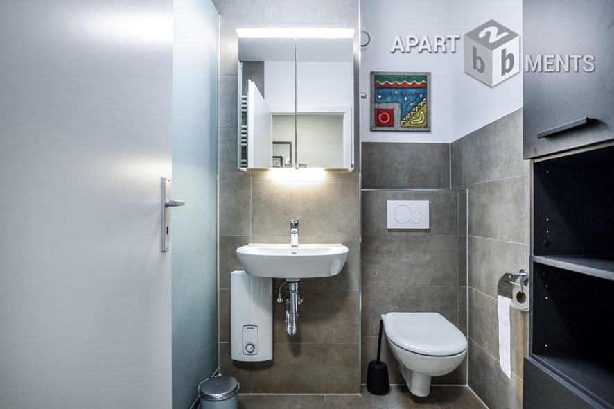 Furnished apartment with balcony in the AXA skyscraper in Cologne-Riehl