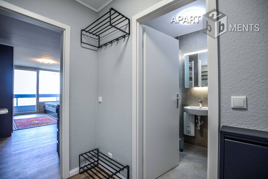 Furnished apartment with balcony in the AXA skyscraper in Cologne-Riehl