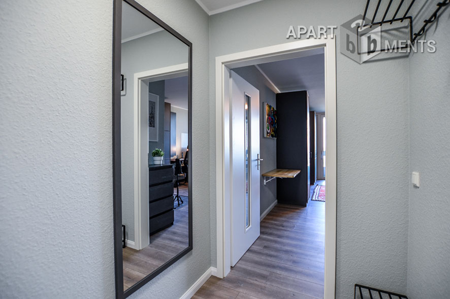 Furnished apartment with balcony in the AXA skyscraper in Cologne-Riehl