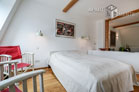 Erstklassig sanierte 1-Zimmer-Altbauwohnung mit sehr stilvoller moderner Möblierung