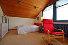 Modern furnished guest room with sloping ceilings in Hilden