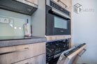 Furnished, fully air-conditioned maisonette apartment with roof terrace in Leverkusen-Küppersteg